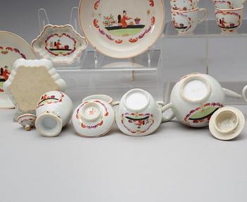 A famille rose 'European Subject' miniature service, Qing dynasty, Qianlong (1736-95). (36 pieces).