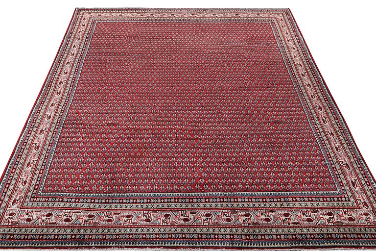 A Sarouk/Boteh carpet, c. 352 x 250 cm.