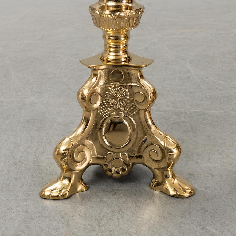A pair of late 20th century or early 21th century brass altar candlesticks.