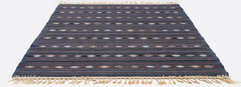 Barbro Nilsson, a carpet, 'Blåbär mörk', tapestry weave, c. 215 x 149 cm, signed AB MMF BN.