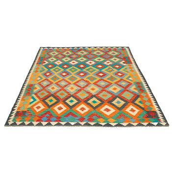 A kilim carpet, c 300 x 205 cm.