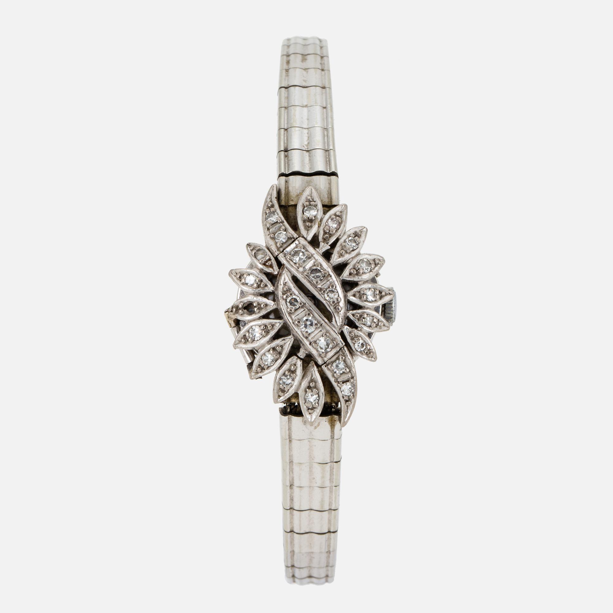 A ladies diamond watch.