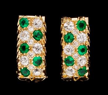 706. A pair of gold, emerald and diamond earrings.