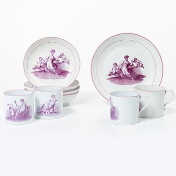 A purple camaieu part coffee service, Early 19th century.