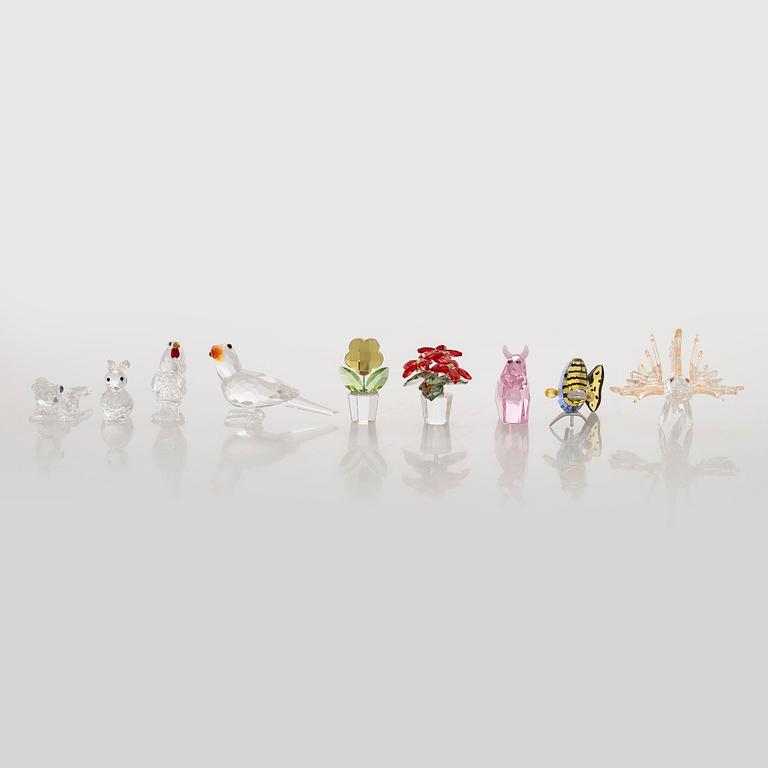 Swarovski, a set of 9 crystal figurines, late 20th century.