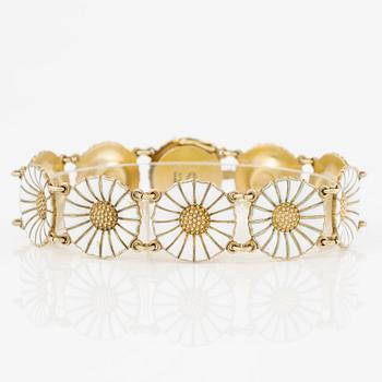 Georg Jensen and A Michelsen "Daisy" a bracelet, a pendant, and a brooch silver gilt and enamel.