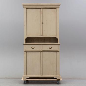 a cabinet from the first half of the 19th century.