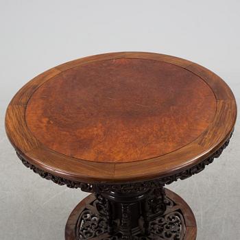 A Chinese wooden table, early 20th century.