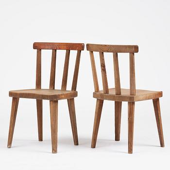 Axel Einar Hjorth, a set of four stained pine "Utö" chairs, Nordiska Kompaniet, Sweden, 1930s.