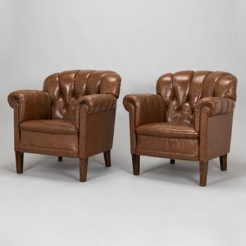 A pair of 1920s armchair.