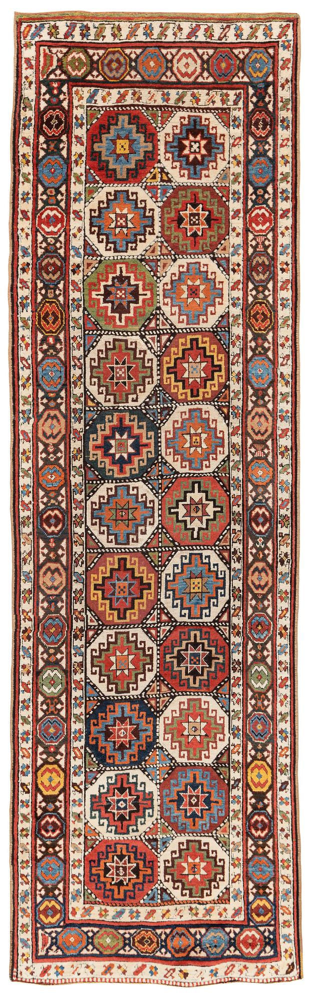An antique Moghan 'Long rug', Kazak region South Caucasus, ca 360 x 106,5 cm.