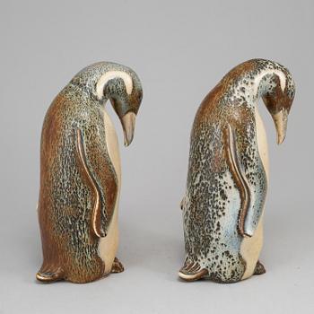 GUNNAR NYLUND, two penguine stoneware figurines from Rörstrand.