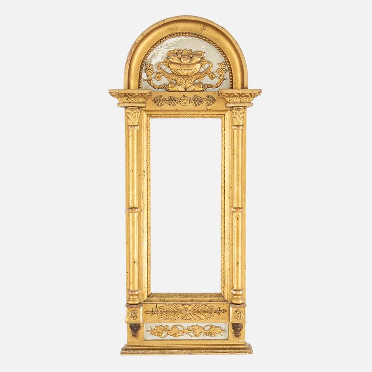 A lat Gustavian mirror from around  the year 1800.