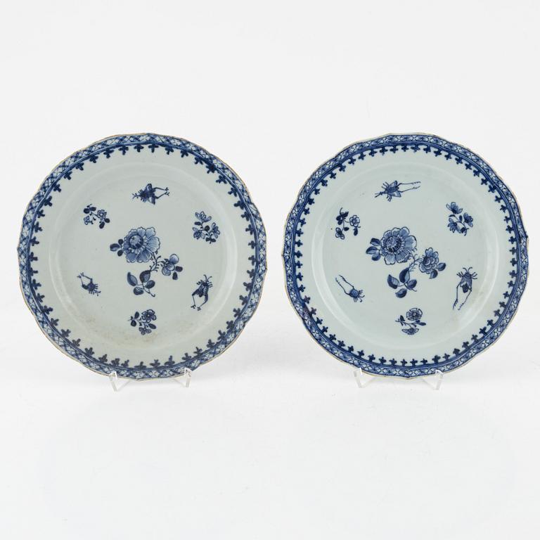 A set of four blue and white dinner plates, Qing dynasty, 18th Century.