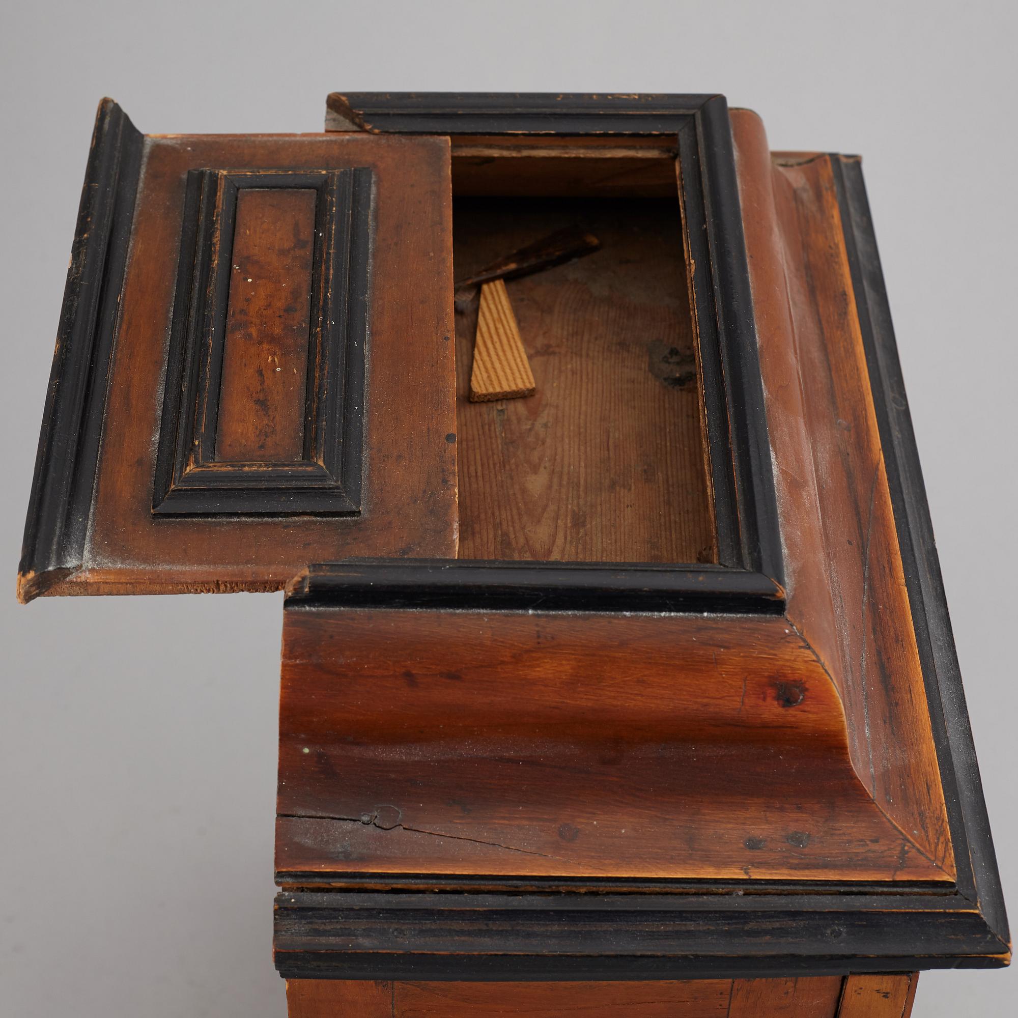 A barocque style spice cabinet, late 19th Century.