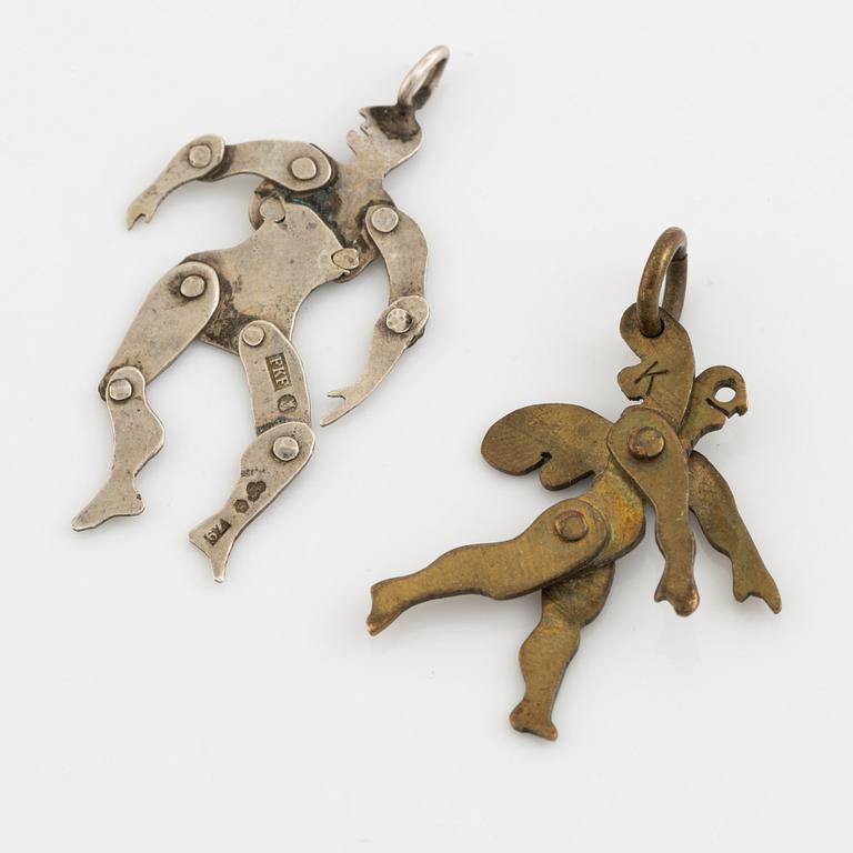 Two pendants, silver and yellow metal.