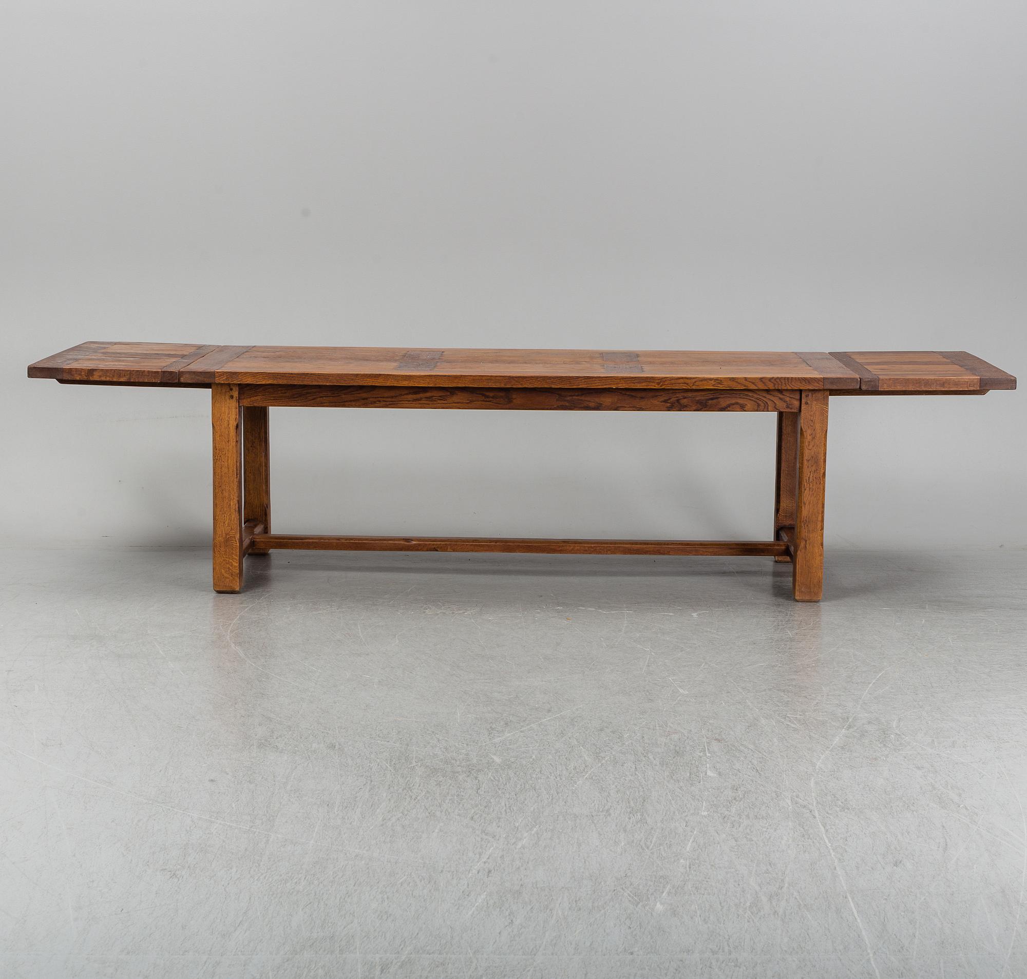 A mid 20th century oak dining table.