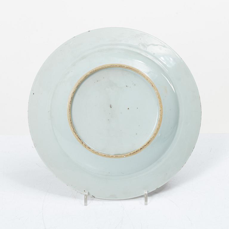 Seven export porcelain plates, China, Qing dynasty, 18th century.