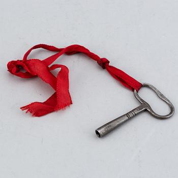 A 19th-century Louis XVI-style mantle clock.