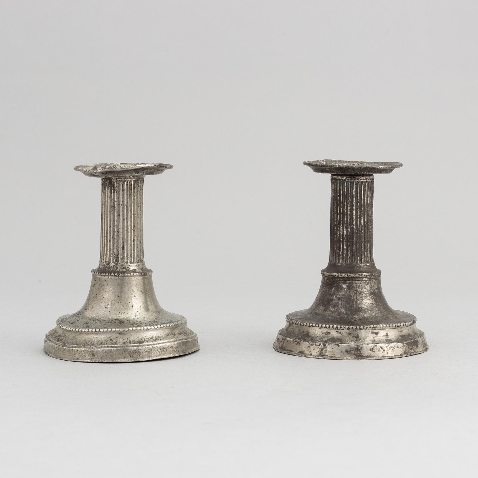 A pair of late gustavian pewter candlesticks, mark of Pehr Johan Mattson (active 1808-1838).