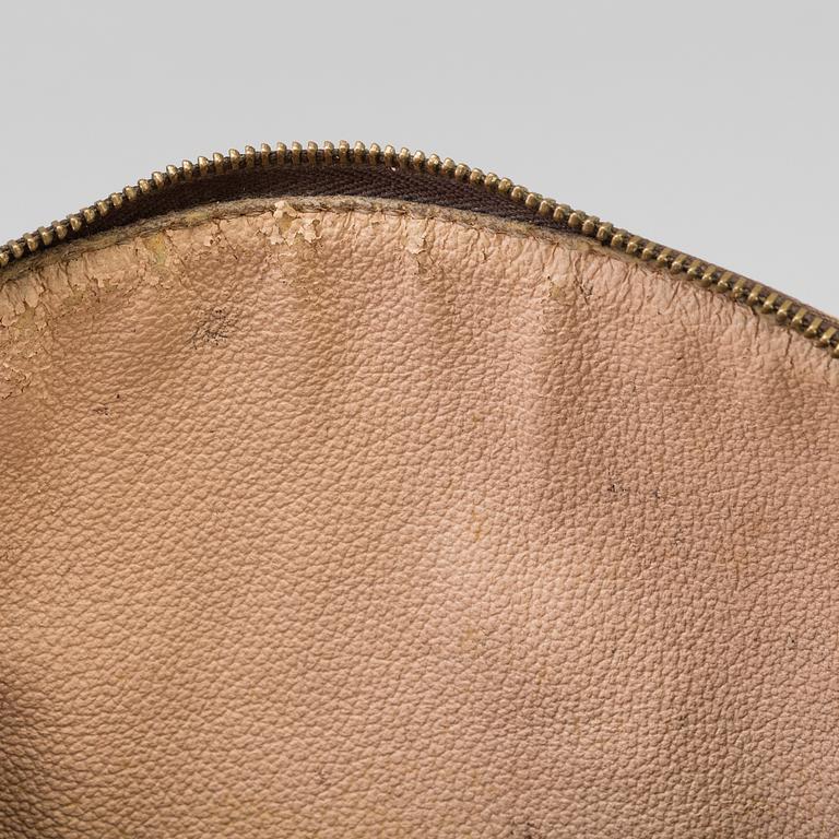 a LOUIS VUITTON make-up bag.