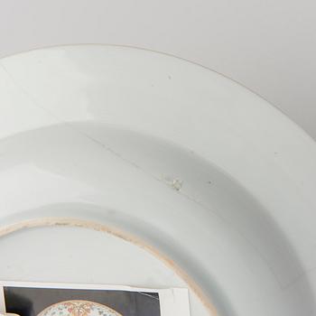 A CHINESE SOUP PLATE, amorial procelain. Qing dynasty, Qianlong (1736-95).