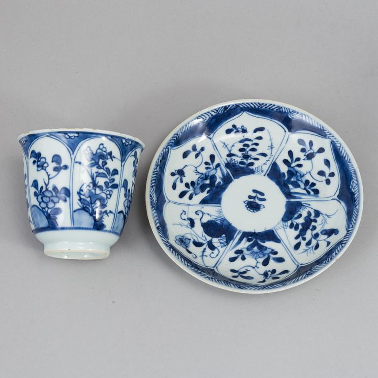 A group of eight blue and white porcelain objects, mostly 18th century.