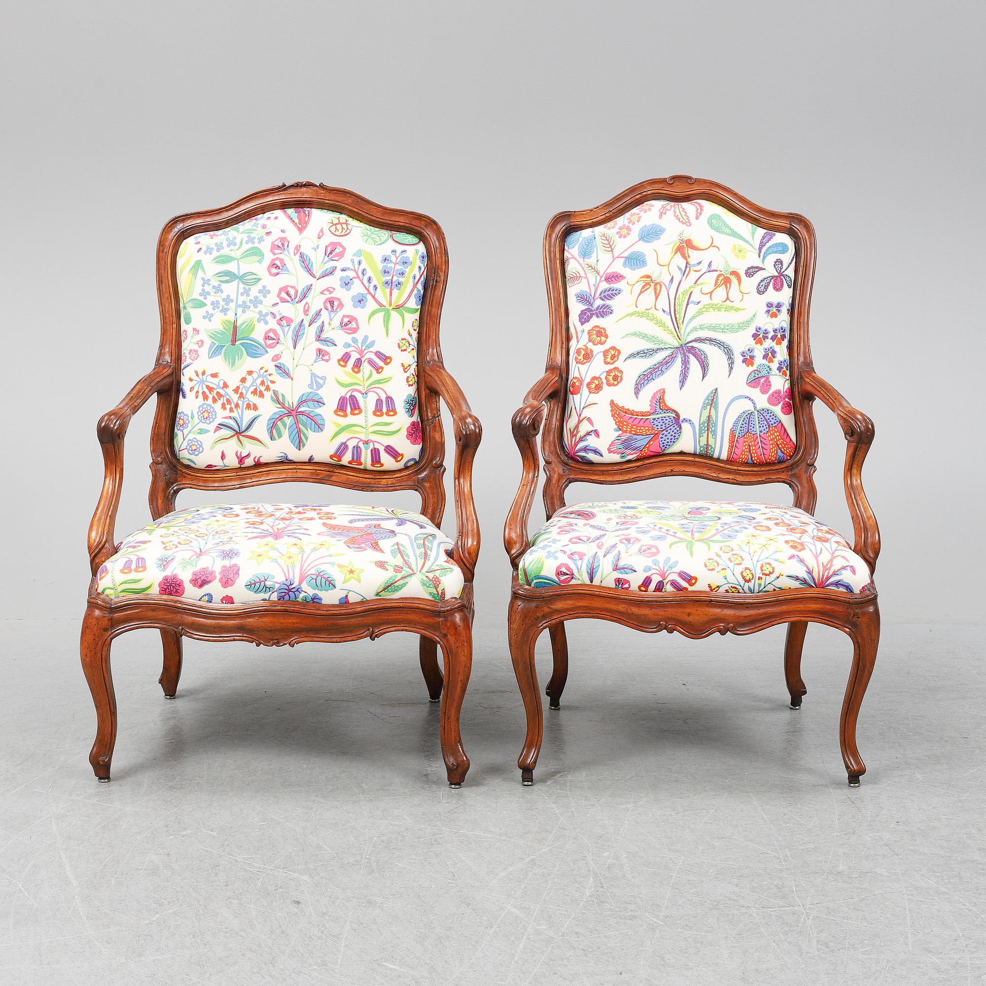 Two 18th century French Louis XV walnut armchairs.
