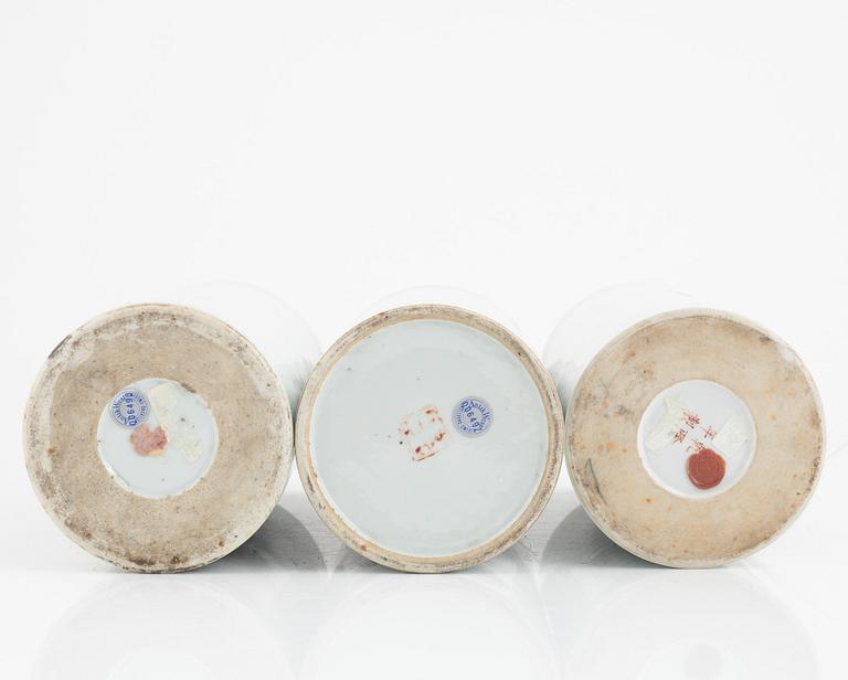 Three porcelain brush pots, 19th-20th century.