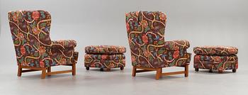 A pair of Svenskt Tenn armchairs with ottomans, model 3543, "Oxford".