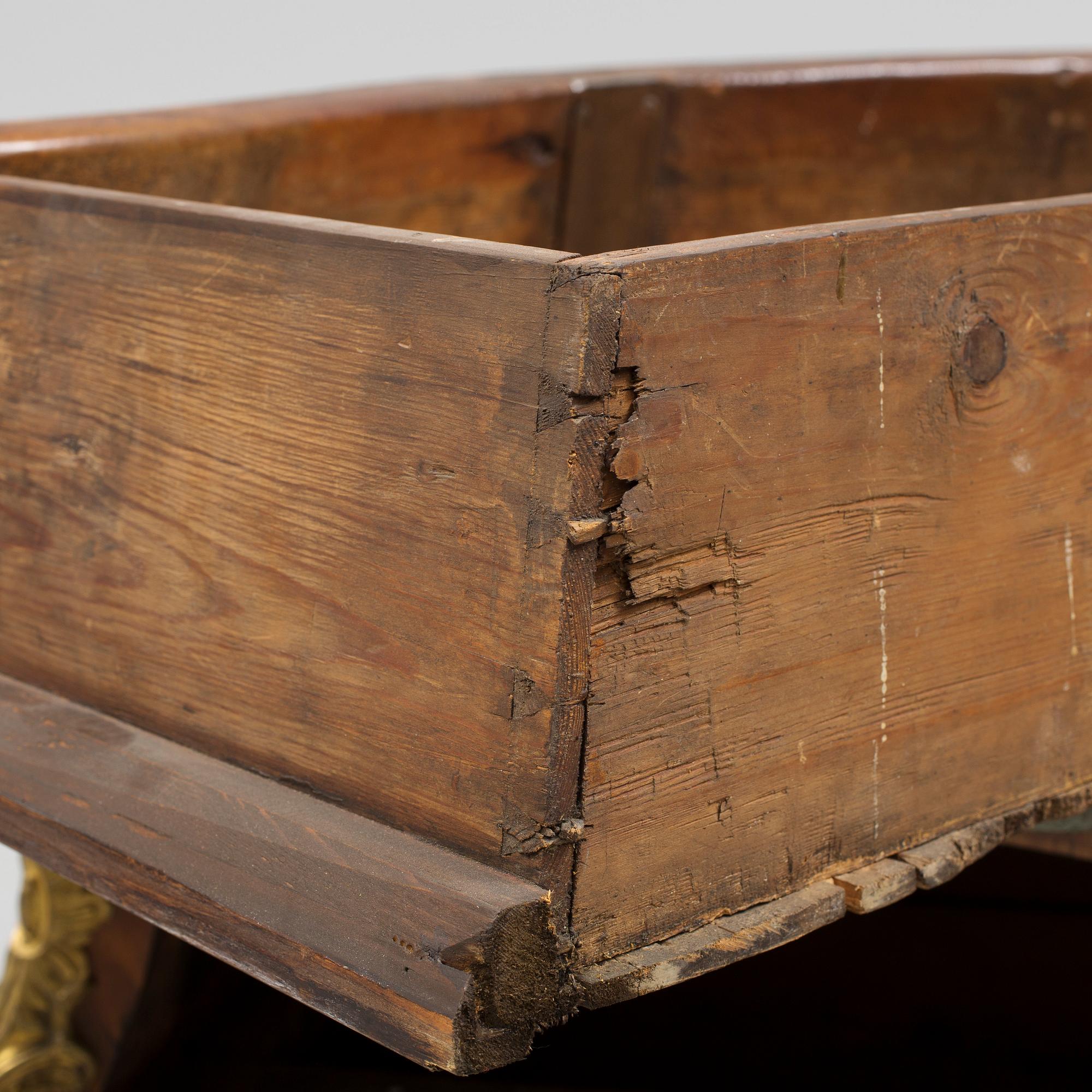 A 1700s rococo commode.