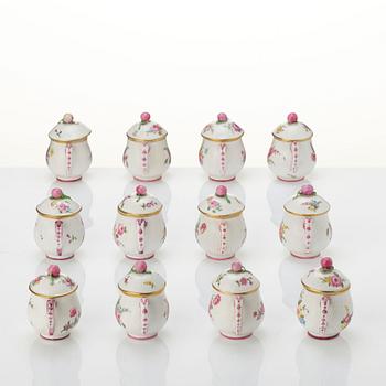 A set of 12 Swedish Marieberg custard cups with covers, 18th century.