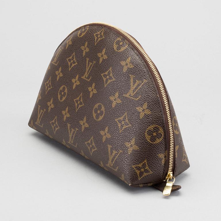 A LOUIS VUITTON COSMETIC POUCH.