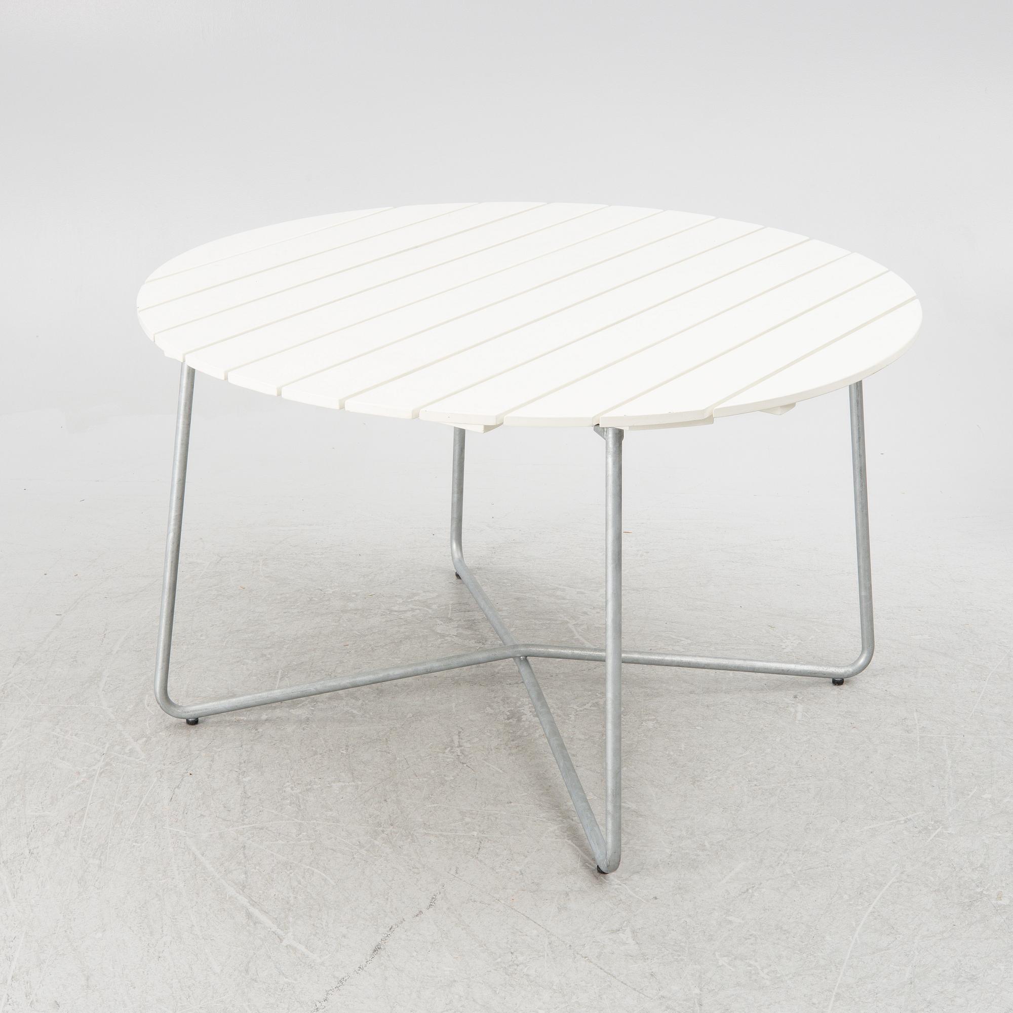 Arthur Lindquist, four armchairs model A2 and a table 9A, Grythyttan's steel furniture.