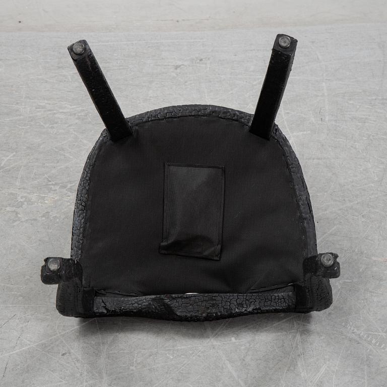 Maarten Baas, a promotional "Smoke dining chair" for Moooi,  after 2002.