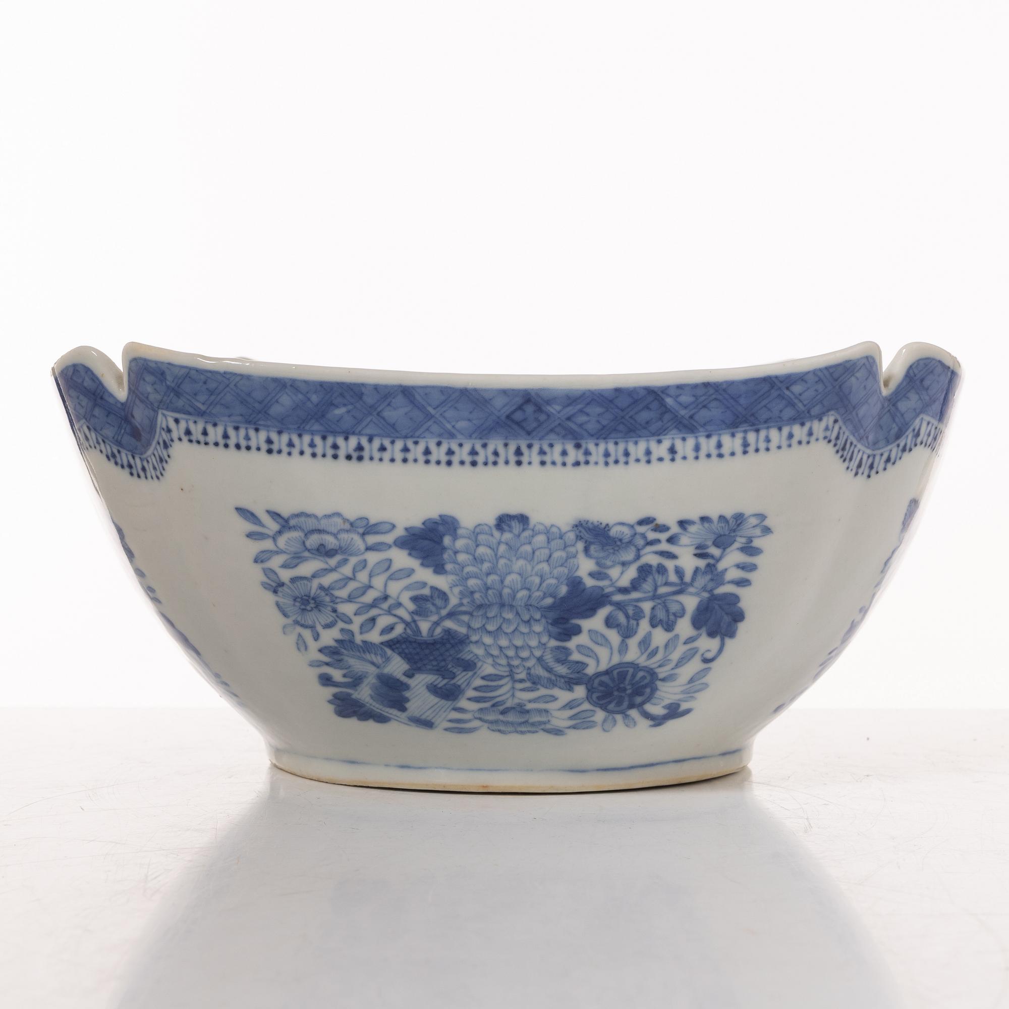 A group  of three serving dishes, a serving bowl, a cup, and seven plates, porcelain, including China 18th century.