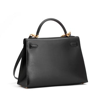 HERMÈS, a black leather, "Kelly 32".