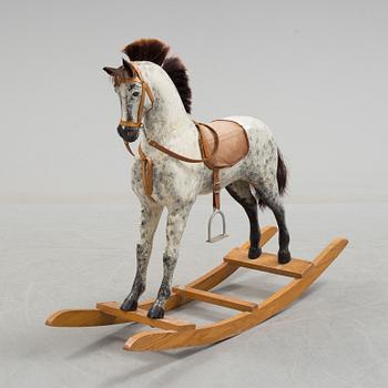 A circa 1900 rocking horse.