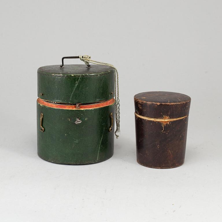 Two Swedish early 19th century boxes with silver beakers and cutlery, mark of JF Bjornstedt, Stockholm 1815.