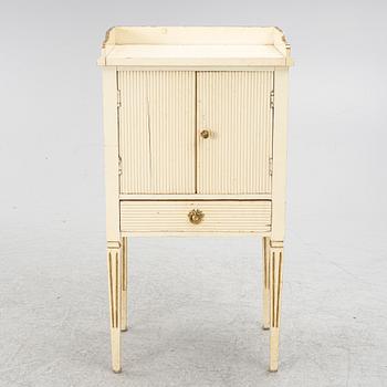 A Gustavian style bedside table, early 20th century.