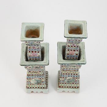 A pair of Chinese porcelain candlesticks, 19th century.