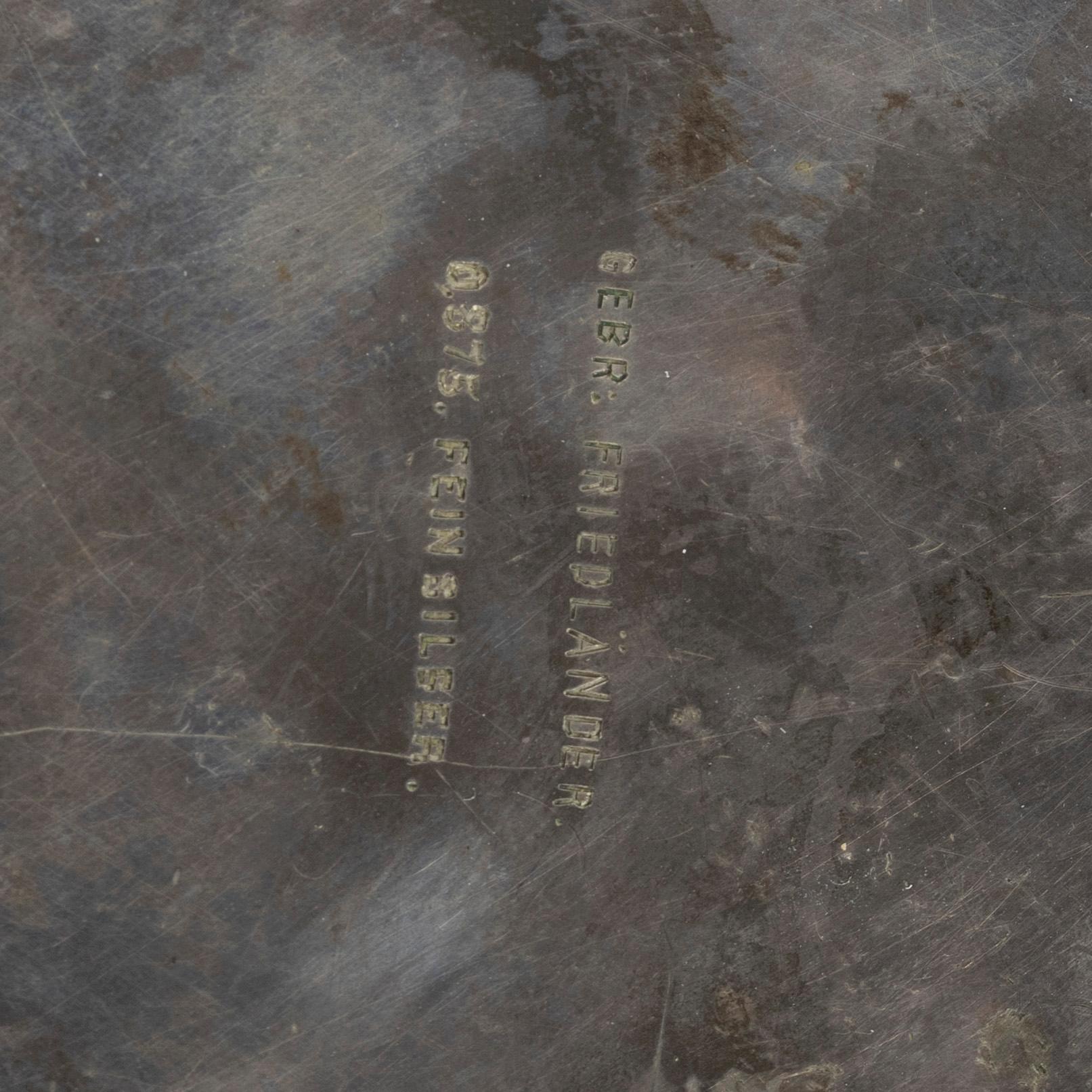 A German silver jug and tray, Gebrüder Friedländer, circa 1900.