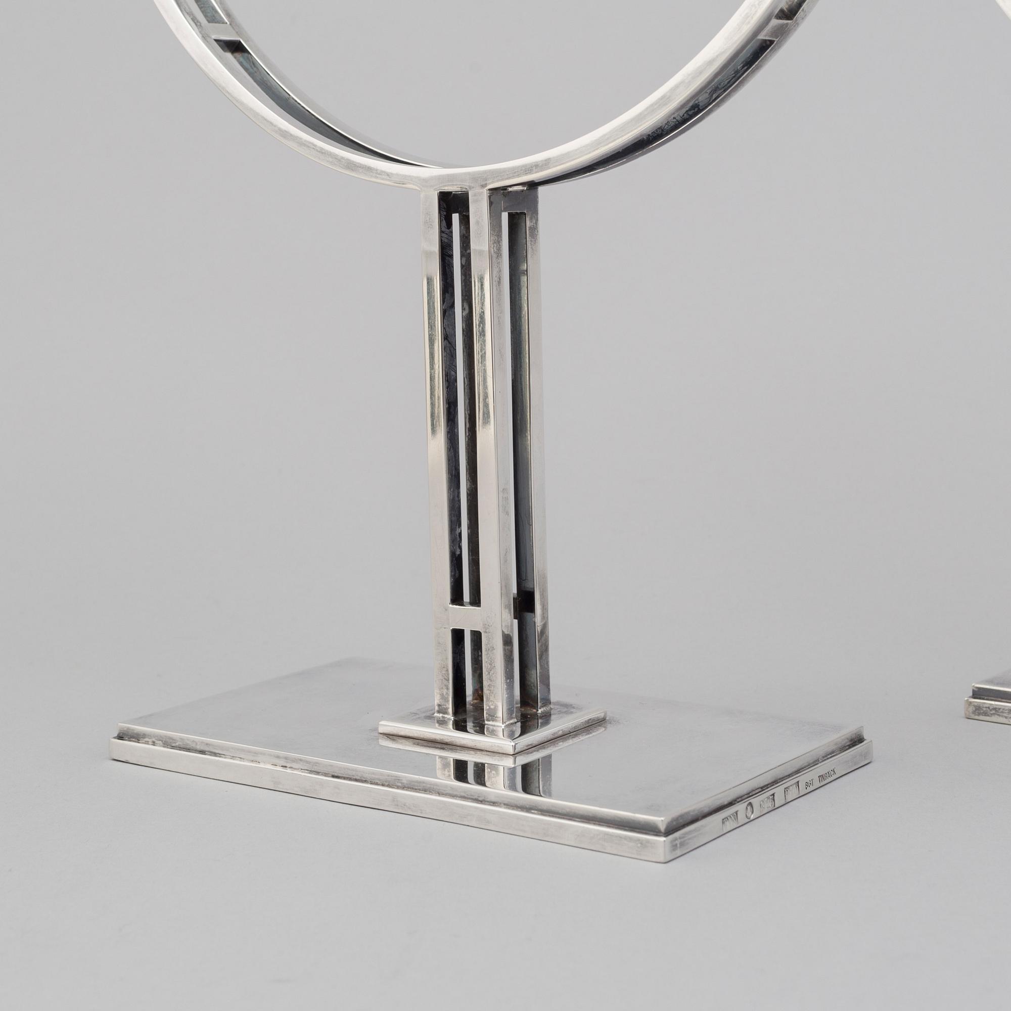 A pair of Klas-Göran Tinbäck two light sterling silver candelabra. Stockholm, 1989.