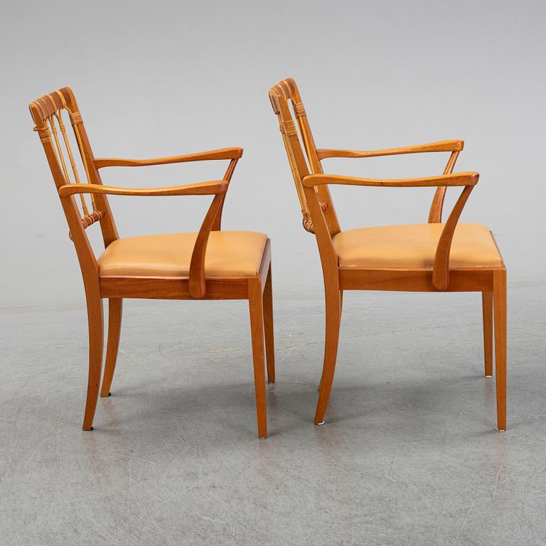 A pair of Josef Frank mahogany and rattan armchairs, Svenskt Tenn, Stockholm, Sweden.