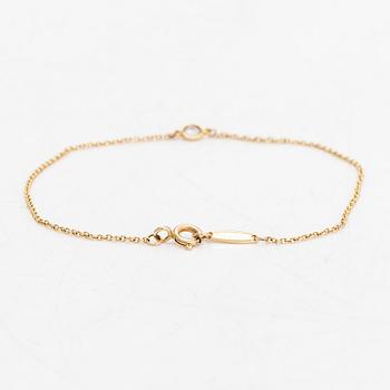 Tiffany & Co, Elsa Peretti, armband, "Diamonds by the Yard", 18K guld med en diamant ca 0.08 ct.