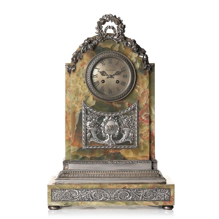 A silver jubilee hardstone and silver mantle clock by W.A. Bolin, Moscow 1912-1017.