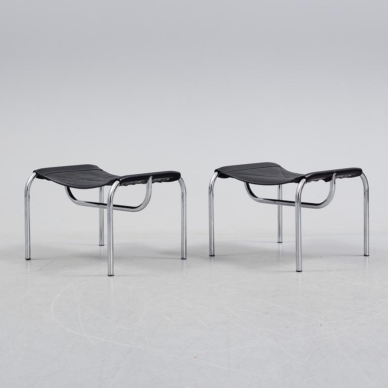 A pair of easy chairs and ottoman, designed by Hans Eichenberger, Strässle, Switzerland.