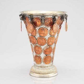 A Swedish 18th century parcel-gilt silver coin-beaker.