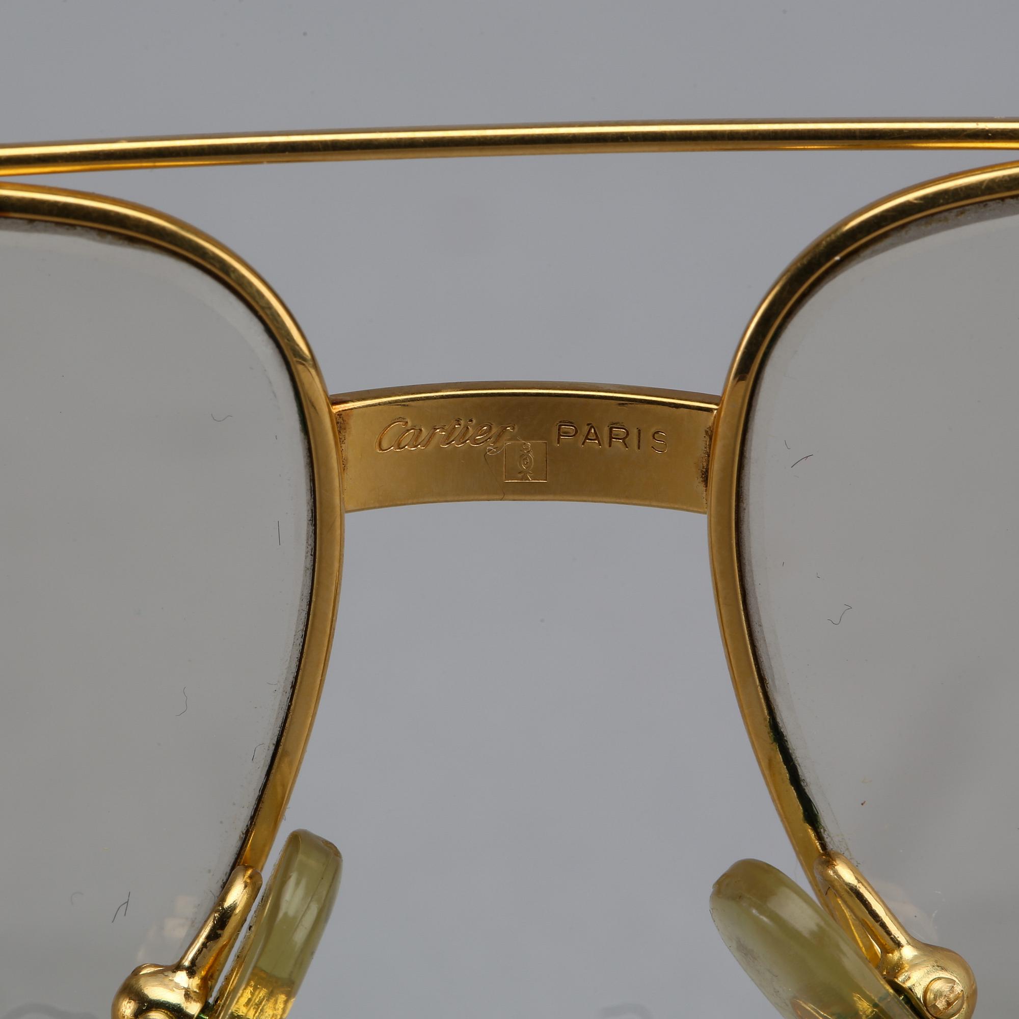 CARTIER, glasses.