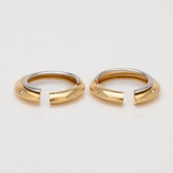 Ole Lynggaard, 18K gold and diamond hoop earrings.